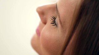 Naked dolly bird teases her smooth peach in solo video