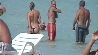 These sluts love swimming topless and they have got nice butts